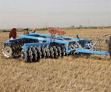 Stubble Type Cultivator With Traction Spring